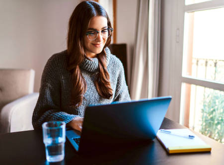 Woman looking at a laptop